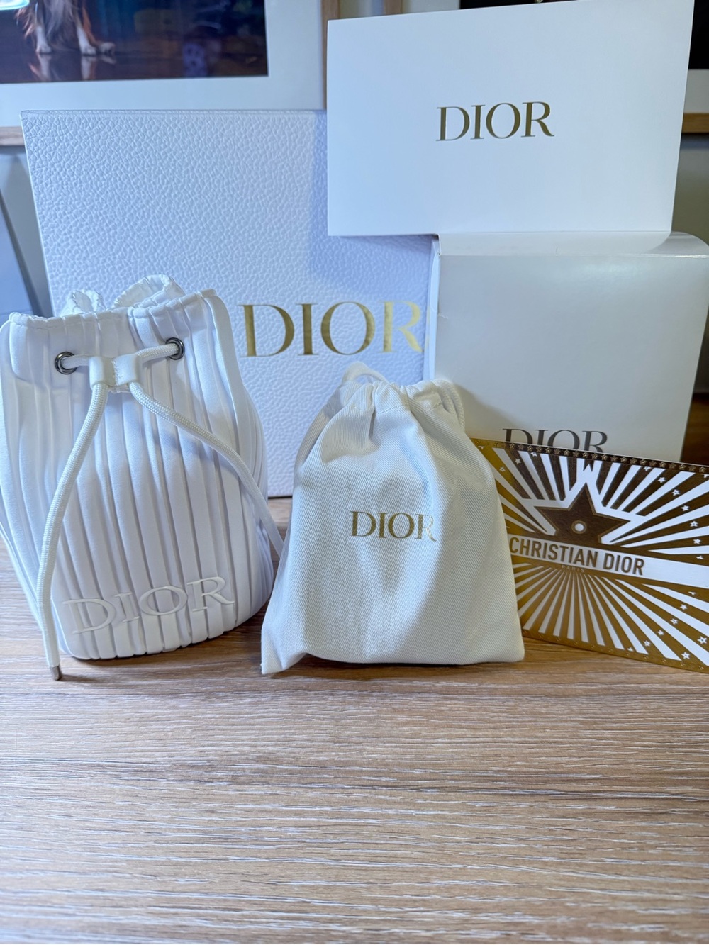 Curated, Dior, Beauty makeup bag and skincare products
